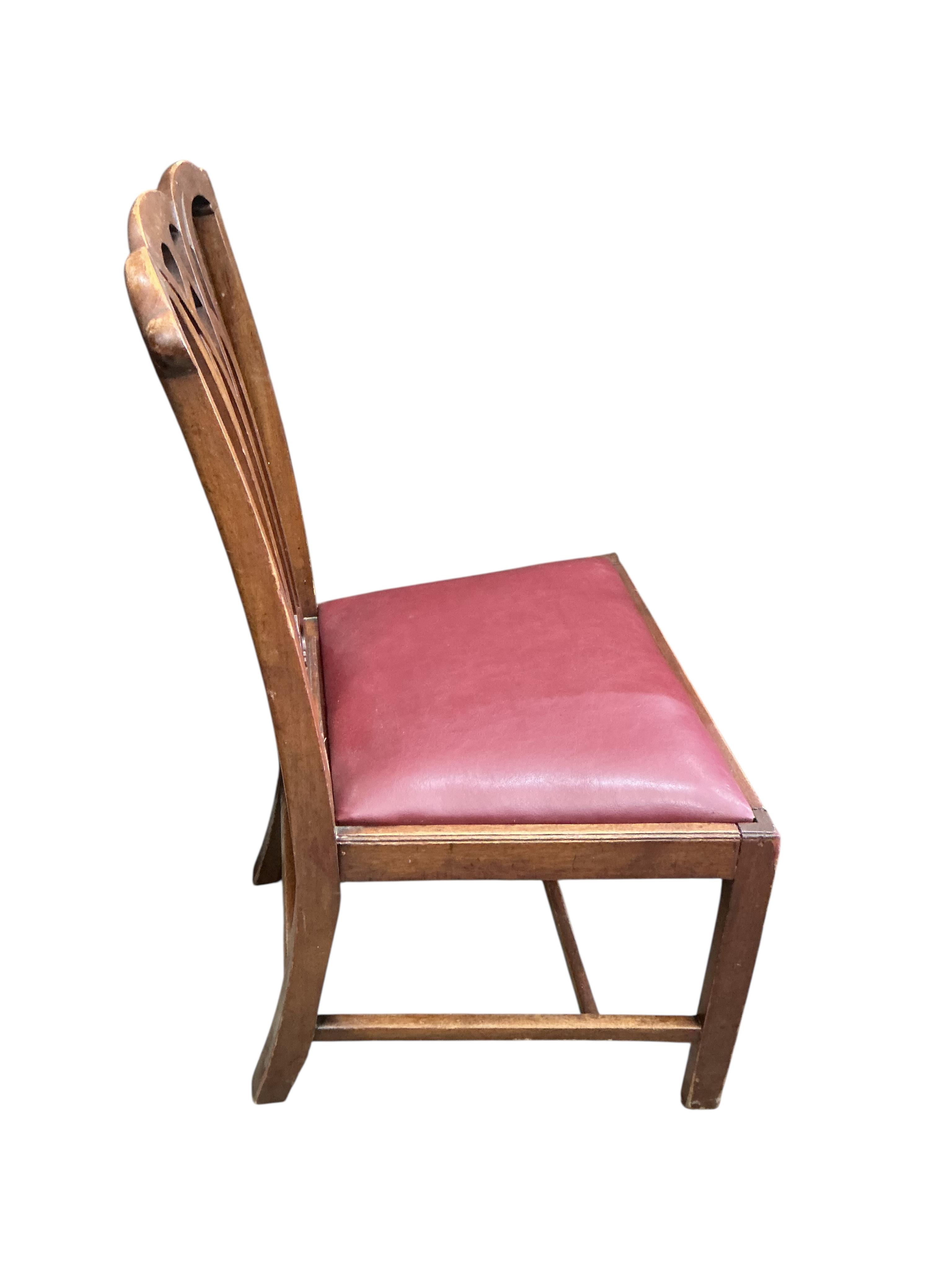 A set of five George III style mahogany dining chairs, one with arms, drop in seats recently re covered. (Bought from the Christie’s Malmesbury House auction, February 2007).